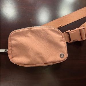 Lululemon pink belt bag that has never been used